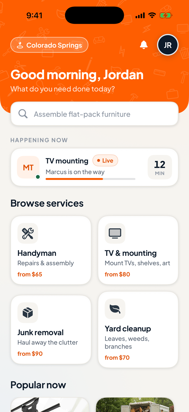 TruliLocal app home screen: Good morning greeting, live job card with your pro on the way, and browsable services with upfront starting prices